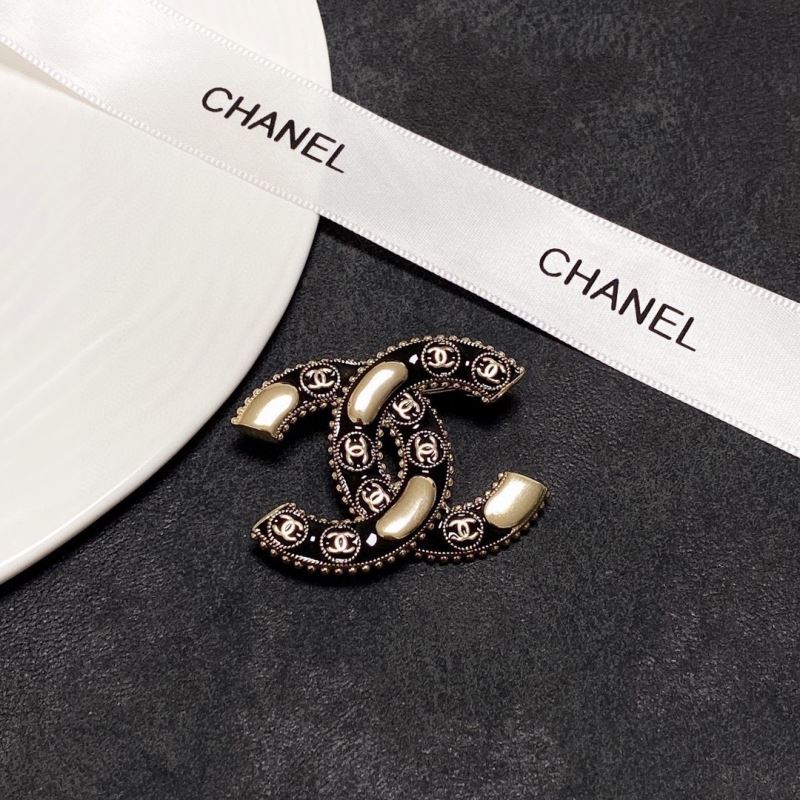 Ch**el brooches